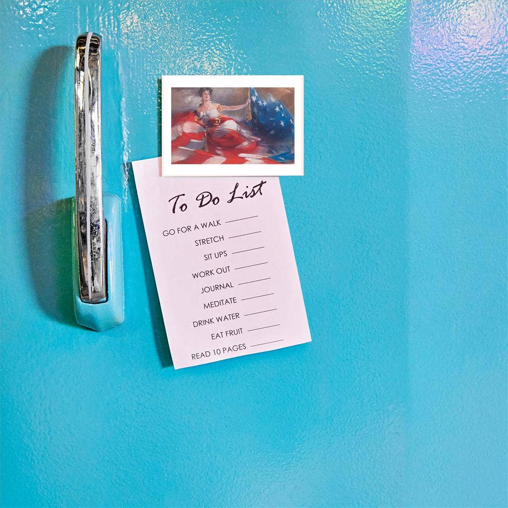 WOMAN DRAPED IN US FLAG MAGNET