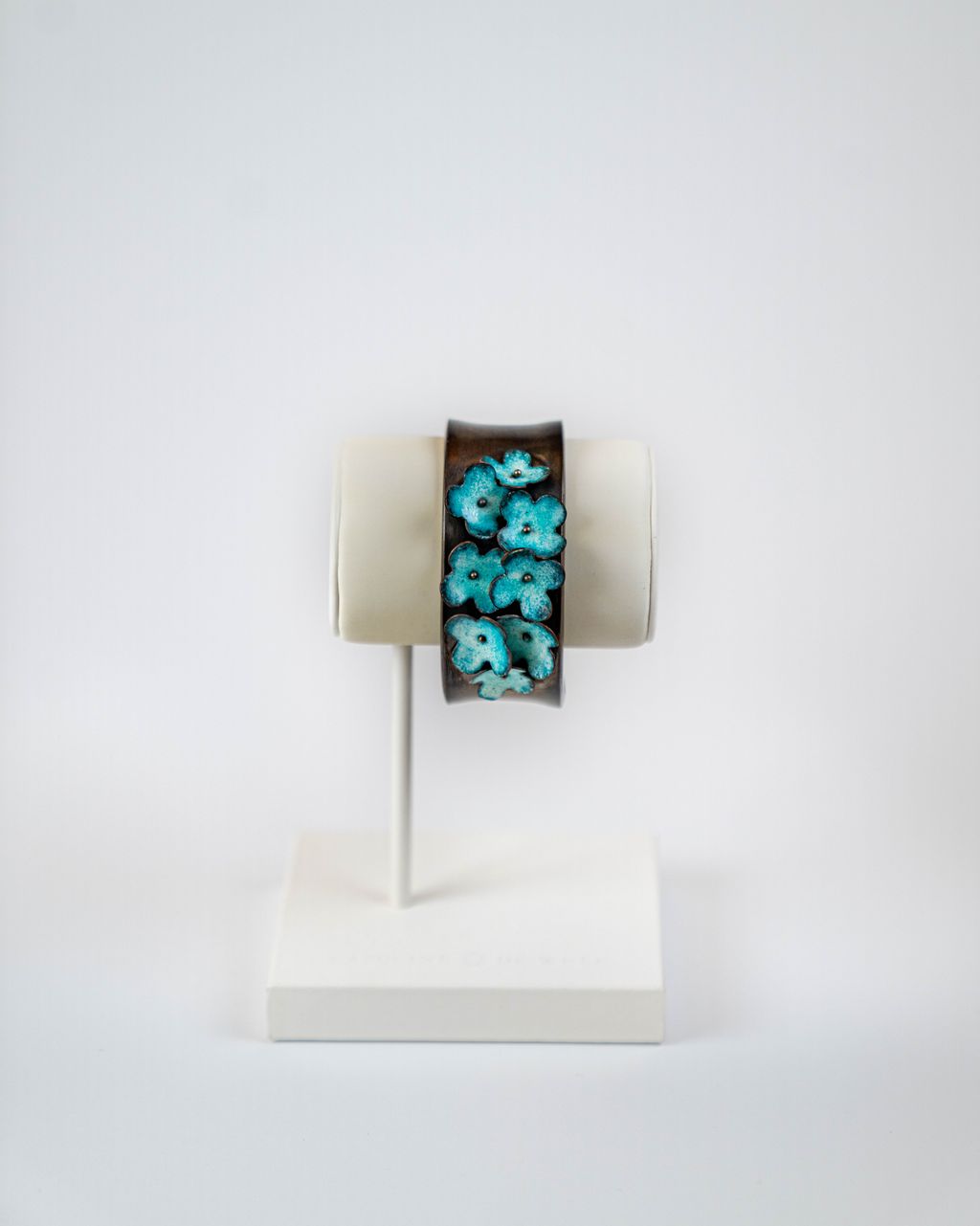 TEAL FLOWER COPPER CUFF BY JENNY WALKER