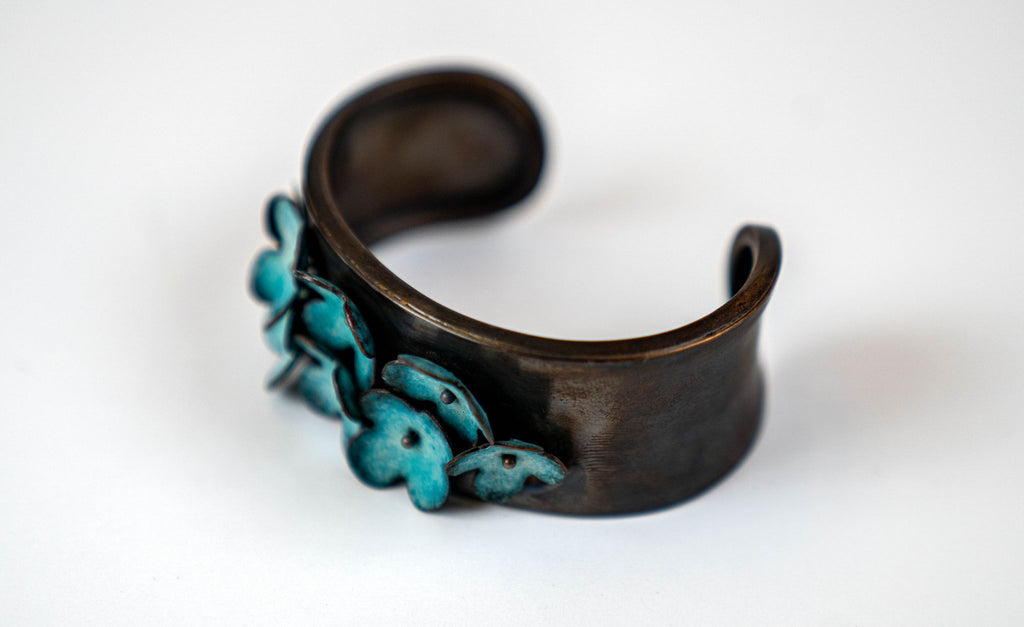 TEAL FLOWER COPPER CUFF BY JENNY WALKER